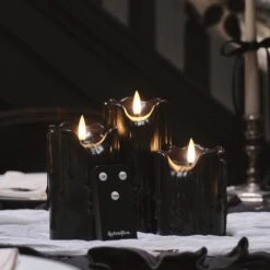 3 Bougies Noires TruGlow® à Effet Cire Fondue 11 3 Bougies Noires TruGlow® à Effet Cire Fondue -Éclairage Domestique CA24036 3 bougies noires truglow a effet cire fondue avec telecommande