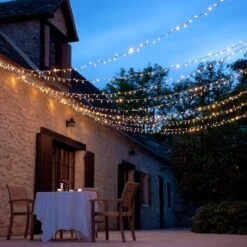 Guirlande Lumineuse Core Connect 20m 200 LED Blanc Chaud Câble Transparent Raccordable 17 Guirlande Lumineuse Core Connect 20m 200 LED Blanc Chaud Câble Transparent Raccordable -Éclairage Domestique ML100YWC Outdoor LED Fairy Lights for Summer Patio Evenings P8 f35a927b 9ca1 43f6 88a0 276e936f2a0a