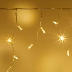 Guirlande Stalactite Core Connect 2m 64 LED Blanc Chaud Câble Transparent Raccordable 8 Guirlande Stalactite Core Connect 2m 64 LED Blanc Chaud Câble Transparent Raccordable -Éclairage Domestique ML64YWC Warm White LED Icicle Light christmas close up P4