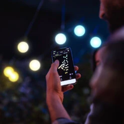 Guinguette Guinguette Twinkly De 10m Avec 20 LED Contrôlables Par Smartphone Édition Gold & Silver 6 Guinguette Guinguette Twinkly De 10m Avec 20 LED Contrôlables Par Smartphone Édition Gold & Silver -Éclairage Domestique TW22001 guirlande guinguette twinkly controlable par smartphone ambre et blanc vue rapproche