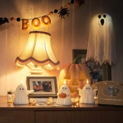 Guirlande Lumineuse à 10 Petits Fantômes En Bocaux 5 Guirlande Lumineuse à 10 Petits Fantômes En Bocaux -Éclairage Domestique deco halloween interieur avec bougies fantomes et guirlande lumineuse a fantome en bocaux