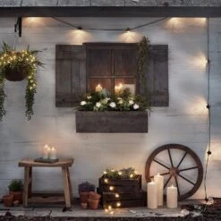 Guirlande Guinguette Core Connect 60 M 120 Ampoules Blanc Chaud Câble Noir Raccordable -Éclairage Domestique guirlande guinguette core connect exterieur devant maisonette avec bougies Truglow 54cd8bf0 9247 497a bc00 5239112019d3